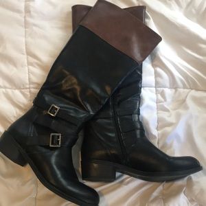 Black and brown knee-high boots